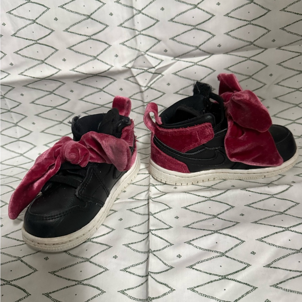 Nike Kids Black Sneakers with Pink Velvet Bow Accents